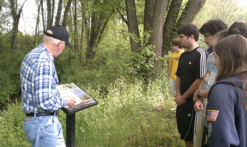 Bill Poulton gives a guided tour to Lycoming College students visiting the Muncy Heritage Park and Nature Trail.